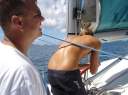 The captain barking orders (crank the halyard, son).