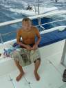 Traig getting ready to fish on our way to Norman Island