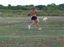 Marissa chasing after the goats