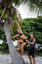 Mar and Britt picking coconuts at Anagada