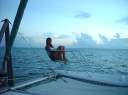 Kristen in her usual spot on the ScubaCat's bow pulpit - Anagada