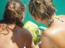 Checking out the puffer fish - notice the gloves on Marissa's hands - you need them!