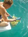 Traig removing the dive bag (net) from the puffer fish